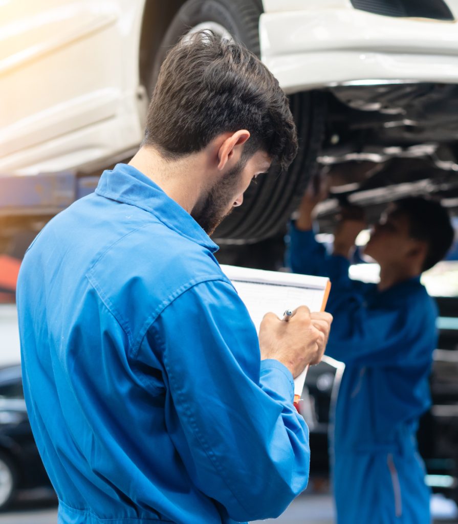 Mechanics looking underneath a vehicle - Car Servicing Fareham | Gosport & Fareham Mechanics | Hampshire Garage